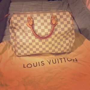 Authentic Louis Vuitton White monogram speedy